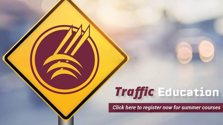 Traffic Education | Click here to register for summer courses [yellow traffic warning sign with MSUN symbol]