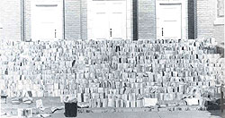 Library books drying on the steps of the Presbyterian church